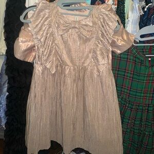 Shimmering Rose Gold Dress with Ruffle Details